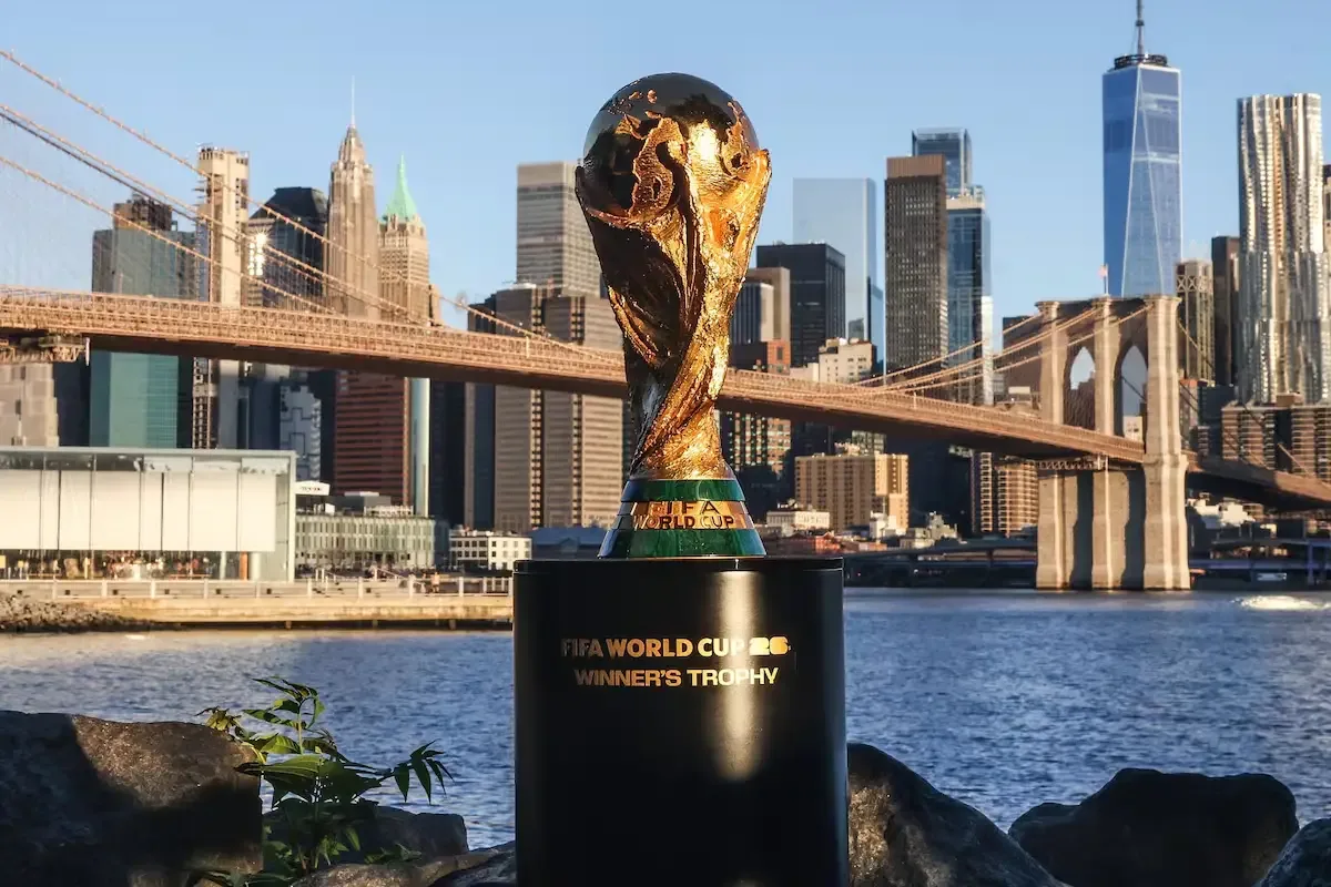 The 2026 World Cup trophy with New York in the background